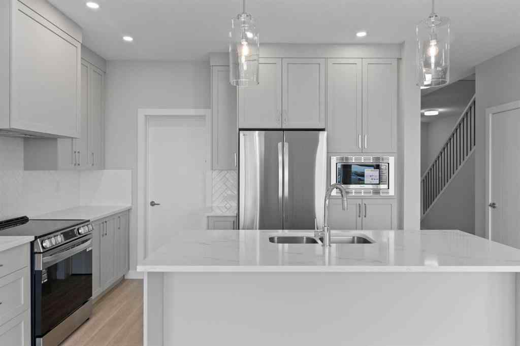 MLS® A2231344 - 1309 South Point Parade SW in South Point Airdrie, Residential