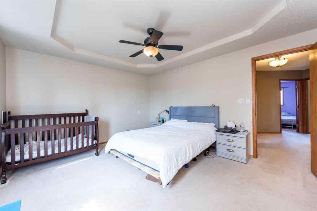 MLS® A2231360 - 363 Hawktree Circle NW in Hawkwood Calgary, Residential