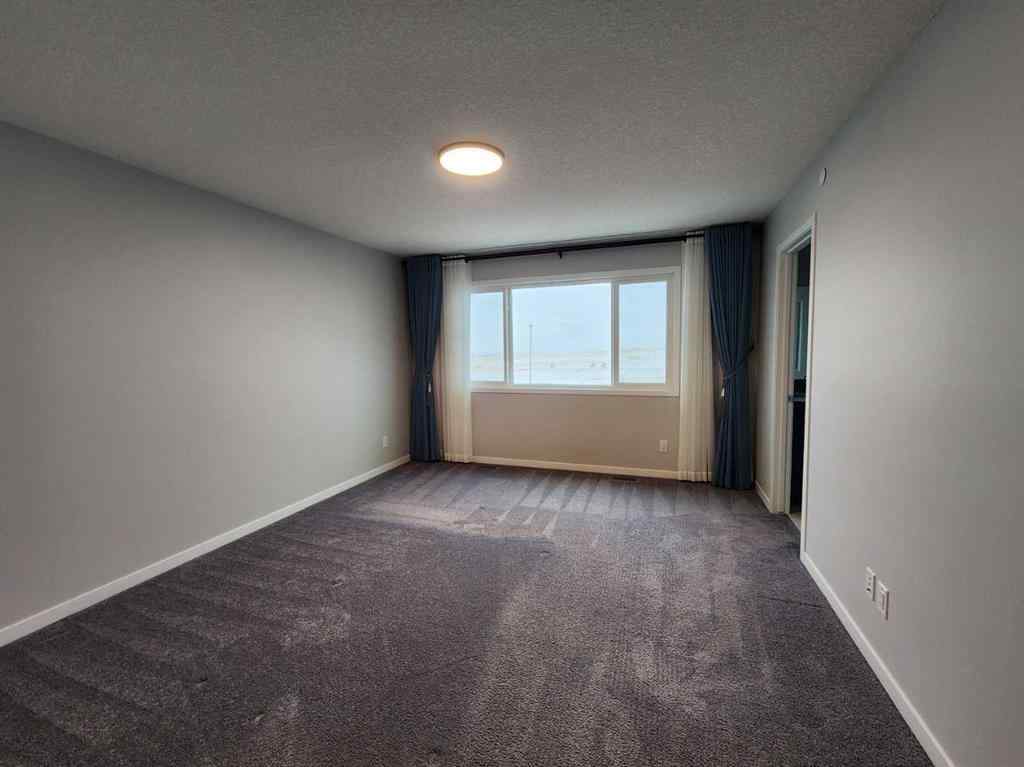MLS® A2231416 - 90 Howse Common NE in Livingston Calgary, Residential