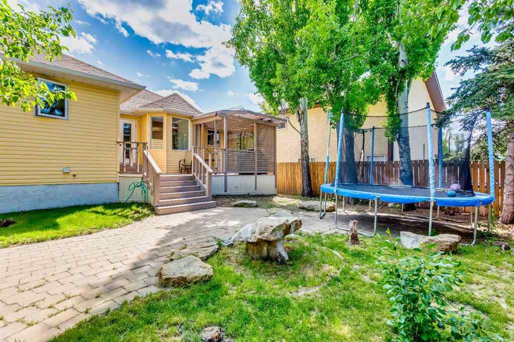 MLS® A2231472 - 123 Woodbend Way  in Woodhaven Okotoks, Residential