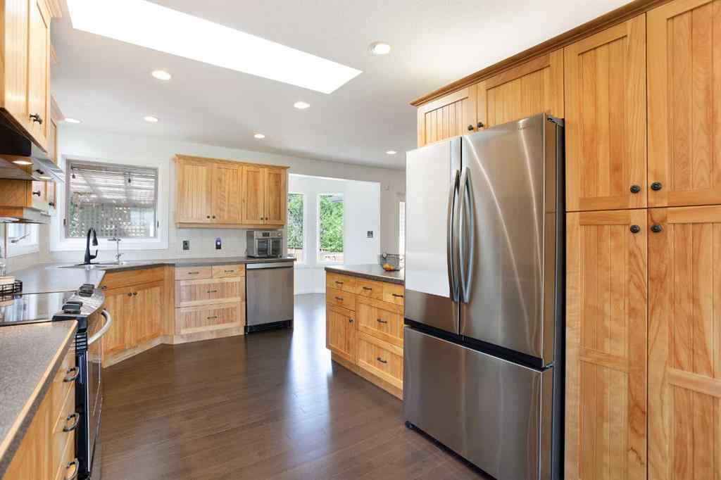 MLS® A2231472 - 123 Woodbend Way  in Woodhaven Okotoks, Residential