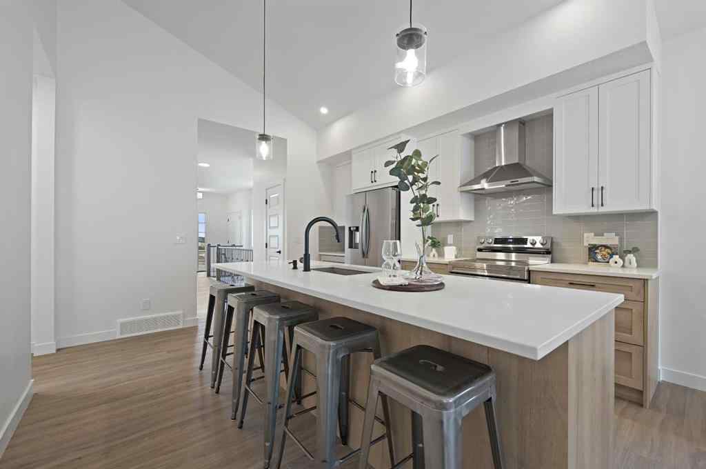 MLS® A2231479 - 13 Bayview Mews SW in Bayview Airdrie, Residential