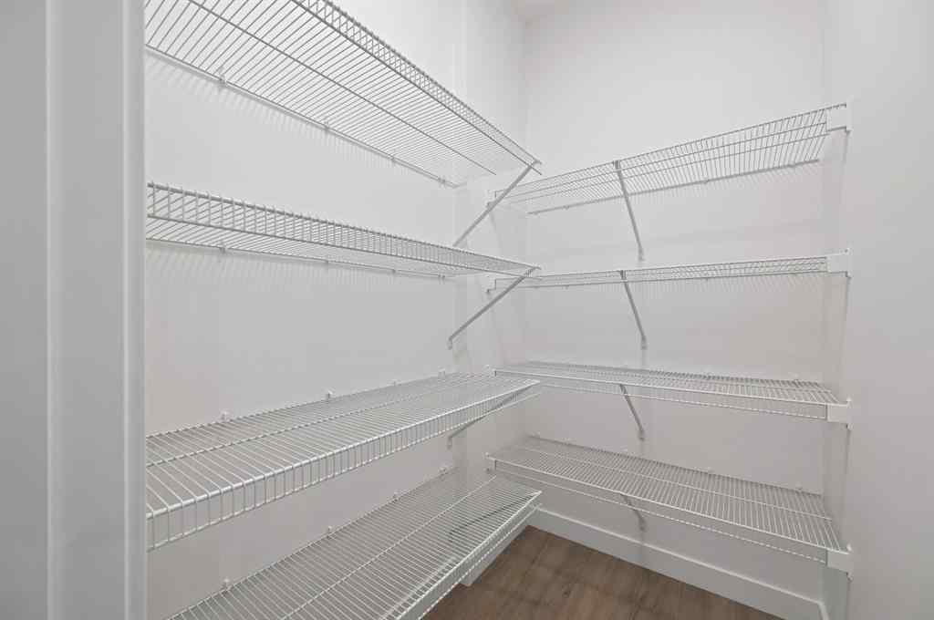 MLS® A2231479 - 13 Bayview Mews SW in Bayview Airdrie, Residential