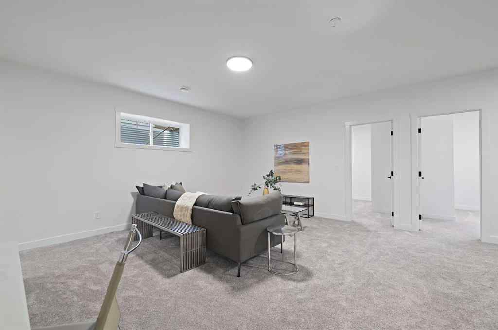 MLS® A2231479 - 13 Bayview Mews SW in Bayview Airdrie, Residential