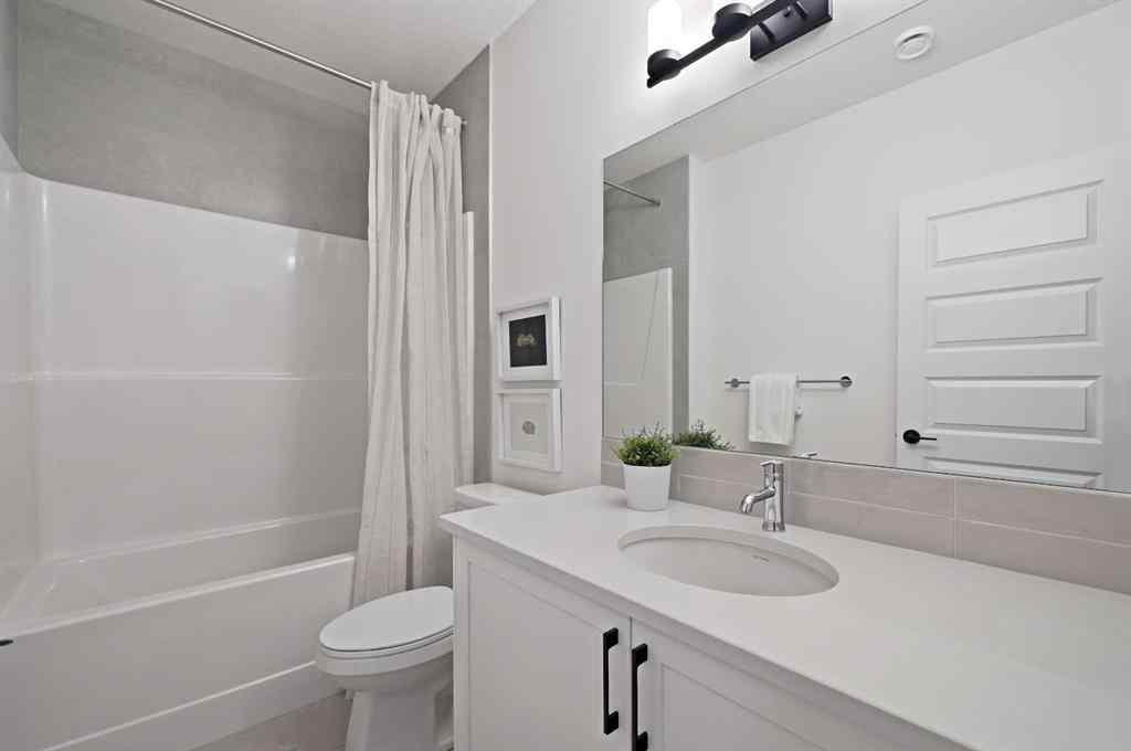 MLS® A2231479 - 13 Bayview Mews SW in Bayview Airdrie, Residential