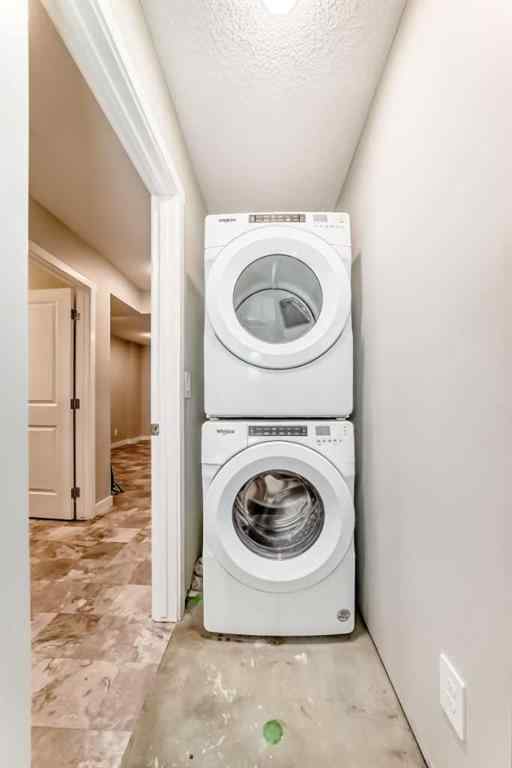 MLS® A2231492 - 157 Belmont Drive SW in Belmont Calgary, Residential