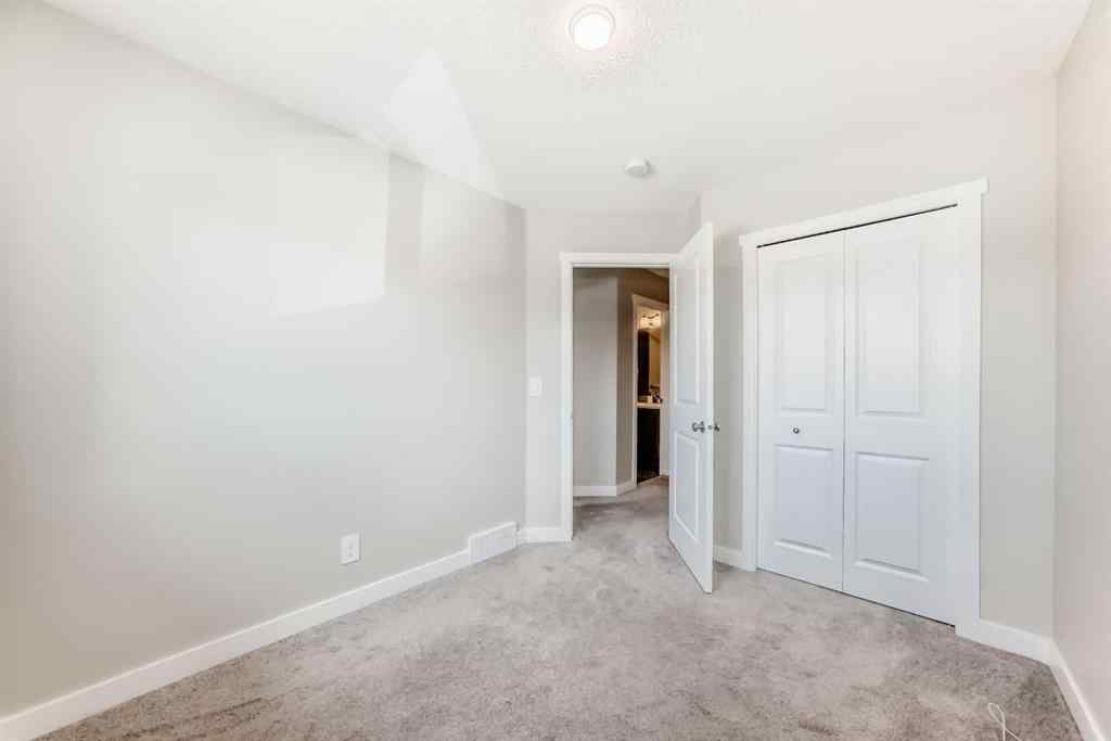 MLS® A2231492 - 157 Belmont Drive SW in Belmont Calgary, Residential