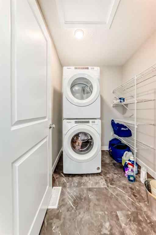 MLS® A2231492 - 157 Belmont Drive SW in Belmont Calgary, Residential