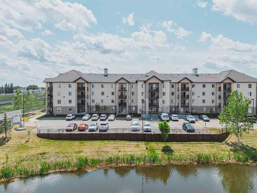 MLS® A2231721 - Unit #7105 304 Mackenzie Way SW in Downtown Airdrie, Residential