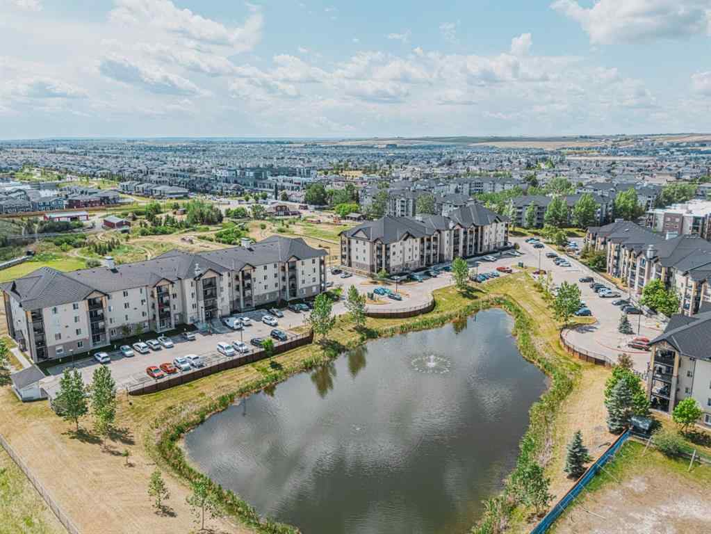 MLS® A2231721 - Unit #7105 304 Mackenzie Way SW in Downtown Airdrie, Residential