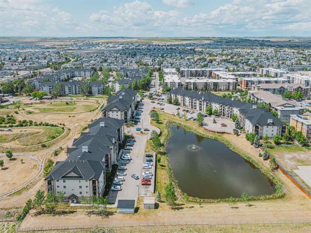 MLS® A2231721 - Unit #7105 304 Mackenzie Way SW in Downtown Airdrie, Residential