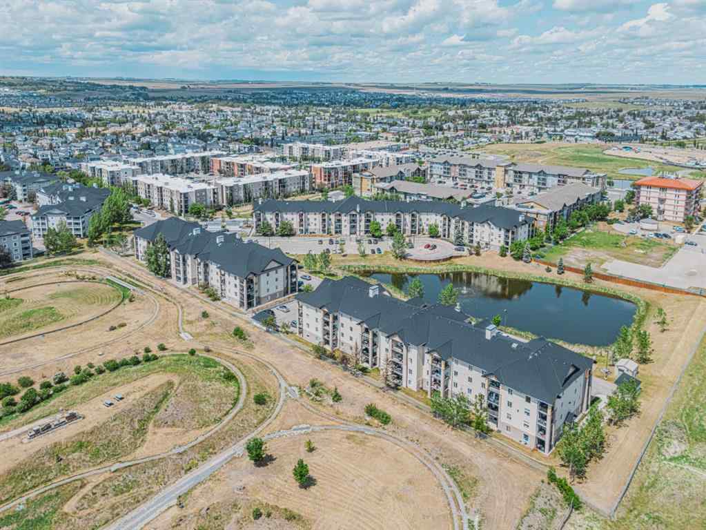 MLS® A2231721 - Unit #7105 304 Mackenzie Way SW in Downtown Airdrie, Residential