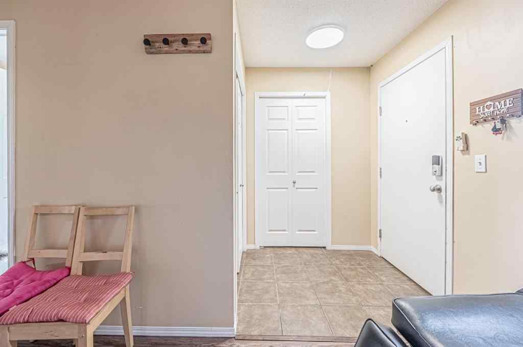 MLS® A2231721 - Unit #7105 304 Mackenzie Way SW in Downtown Airdrie, Residential