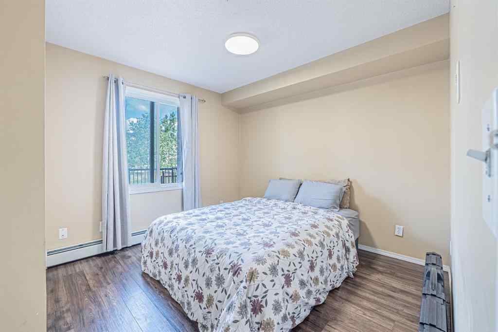 MLS® A2231721 - Unit #7105 304 Mackenzie Way SW in Downtown Airdrie, Residential