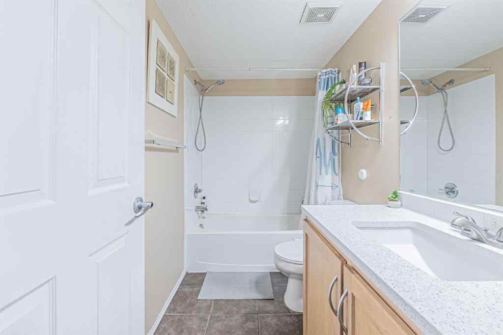 MLS® A2231721 - Unit #7105 304 Mackenzie Way SW in Downtown Airdrie, Residential