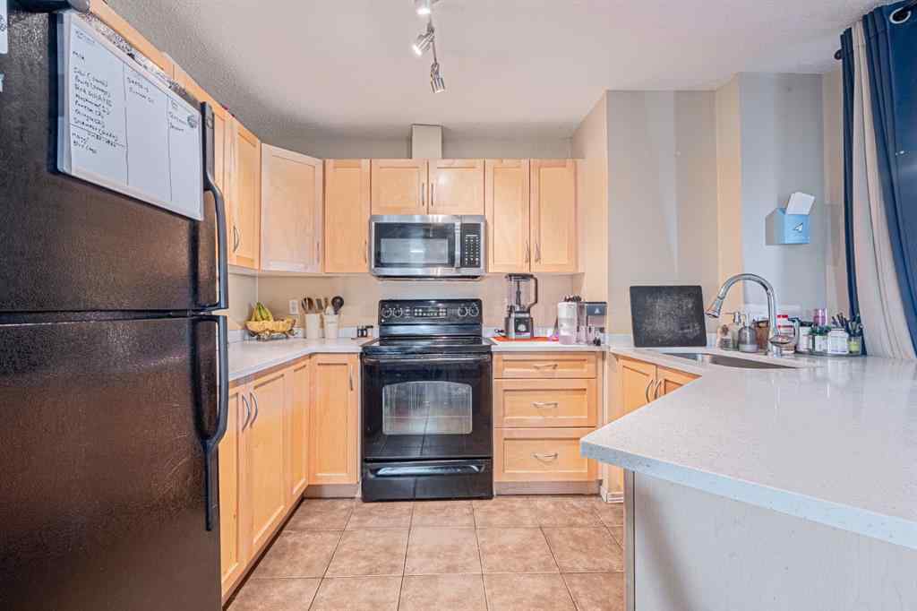 MLS® A2231721 - Unit #7105 304 Mackenzie Way SW in Downtown Airdrie, Residential