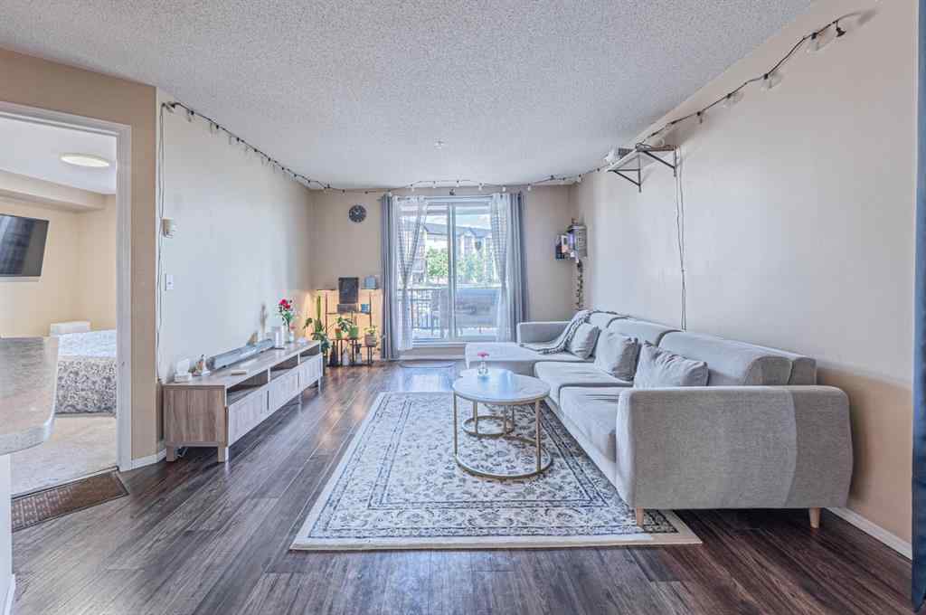 MLS® A2231721 - Unit #7105 304 Mackenzie Way SW in Downtown Airdrie, Residential