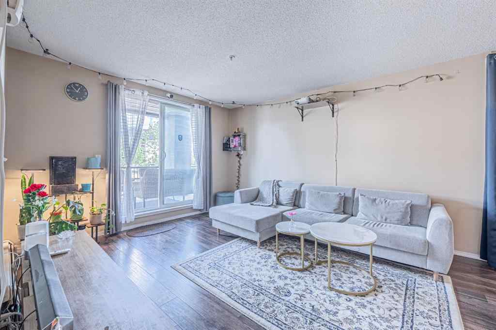 MLS® A2231721 - Unit #7105 304 Mackenzie Way SW in Downtown Airdrie, Residential