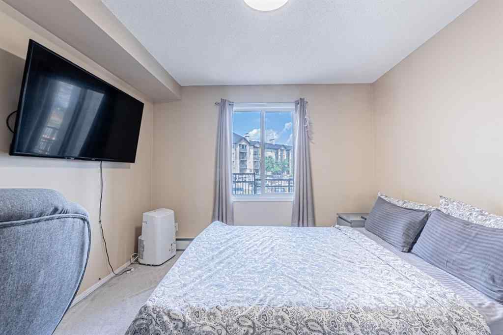 MLS® A2231721 - Unit #7105 304 Mackenzie Way SW in Downtown Airdrie, Residential