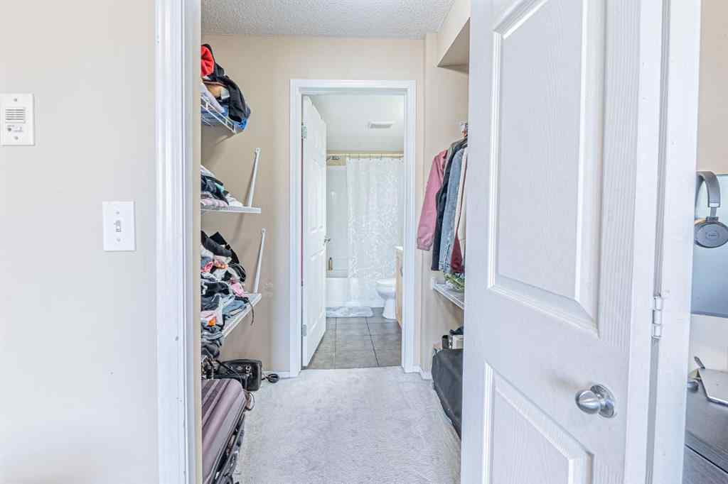 MLS® A2231721 - Unit #7105 304 Mackenzie Way SW in Downtown Airdrie, Residential