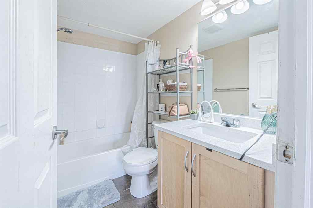 MLS® A2231721 - Unit #7105 304 Mackenzie Way SW in Downtown Airdrie, Residential