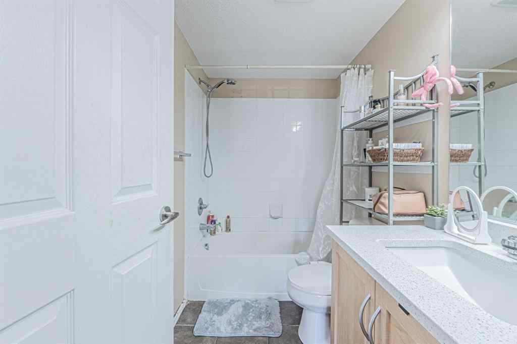 MLS® A2231721 - Unit #7105 304 Mackenzie Way SW in Downtown Airdrie, Residential