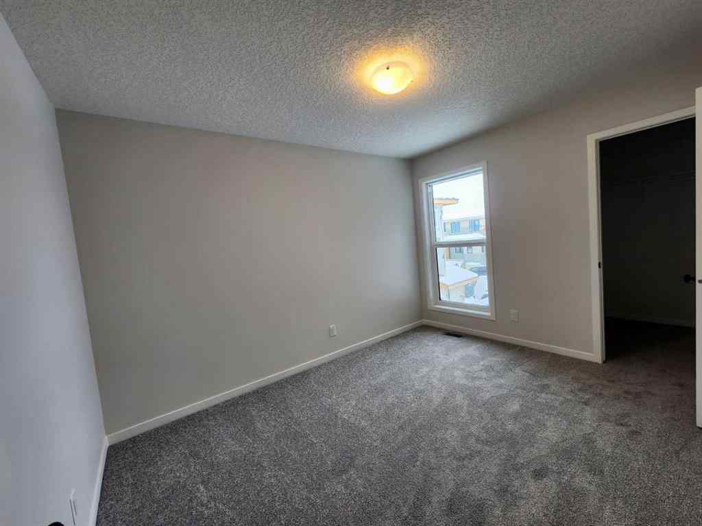 MLS® A2231806 - 86 Lucas Place NW in Livingston Calgary, Residential