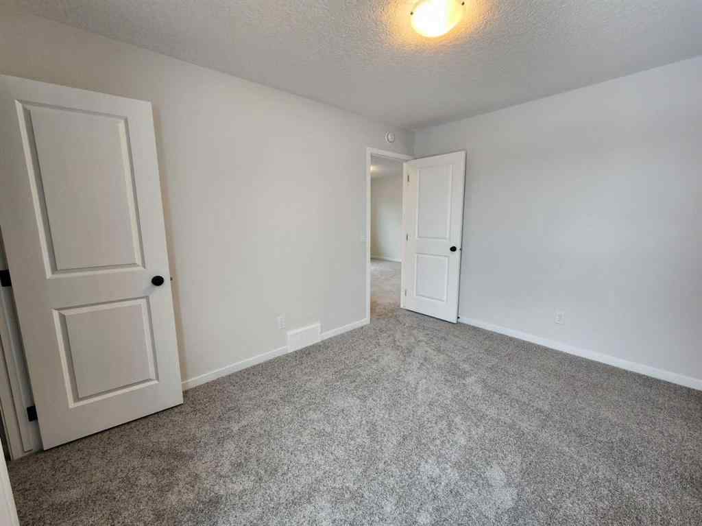 MLS® A2231806 - 86 Lucas Place NW in Livingston Calgary, Residential