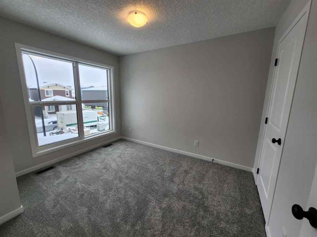 MLS® A2231806 - 86 Lucas Place NW in Livingston Calgary, Residential