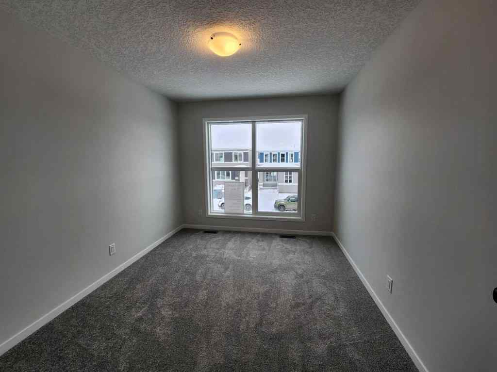 MLS® A2231806 - 86 Lucas Place NW in Livingston Calgary, Residential