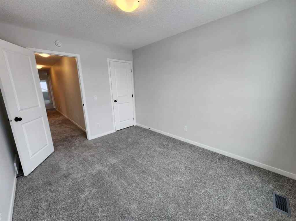 MLS® A2231806 - 86 Lucas Place NW in Livingston Calgary, Residential