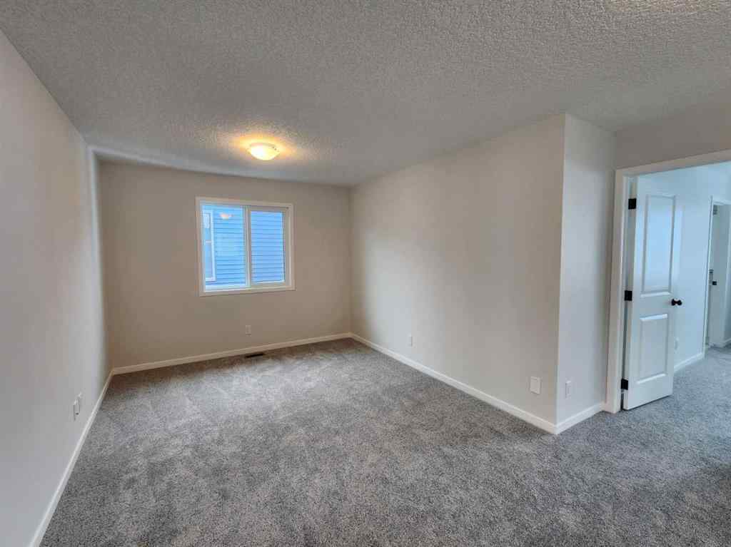 MLS® A2231806 - 86 Lucas Place NW in Livingston Calgary, Residential