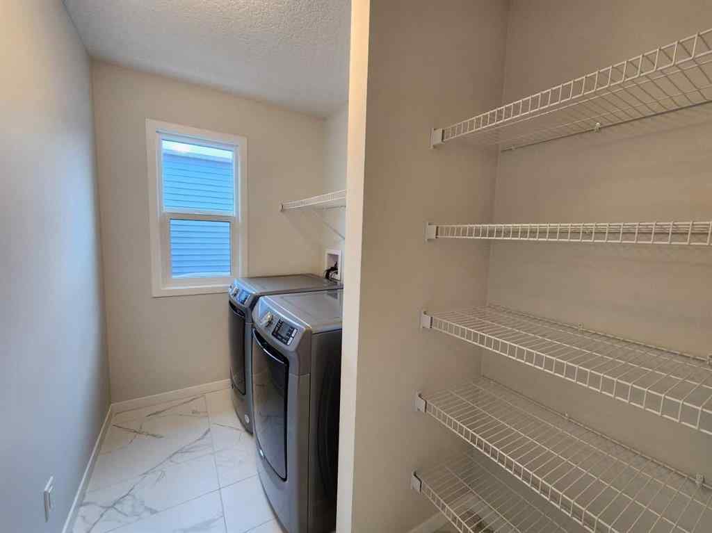 MLS® A2231806 - 86 Lucas Place NW in Livingston Calgary, Residential