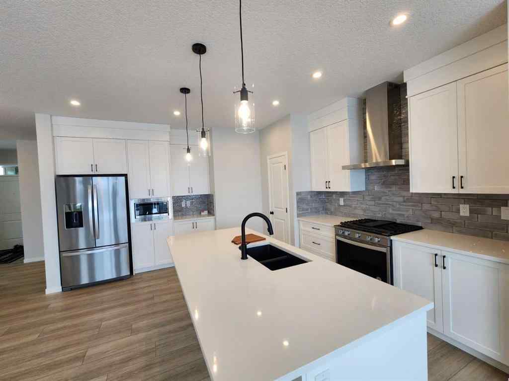 MLS® A2231806 - 86 Lucas Place NW in Livingston Calgary, Residential