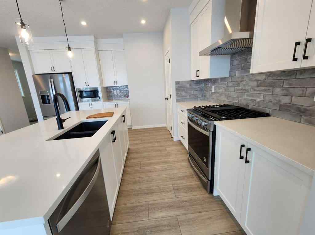 MLS® A2231806 - 86 Lucas Place NW in Livingston Calgary, Residential