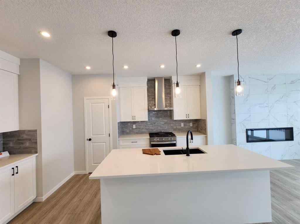MLS® A2231806 - 86 Lucas Place NW in Livingston Calgary, Residential