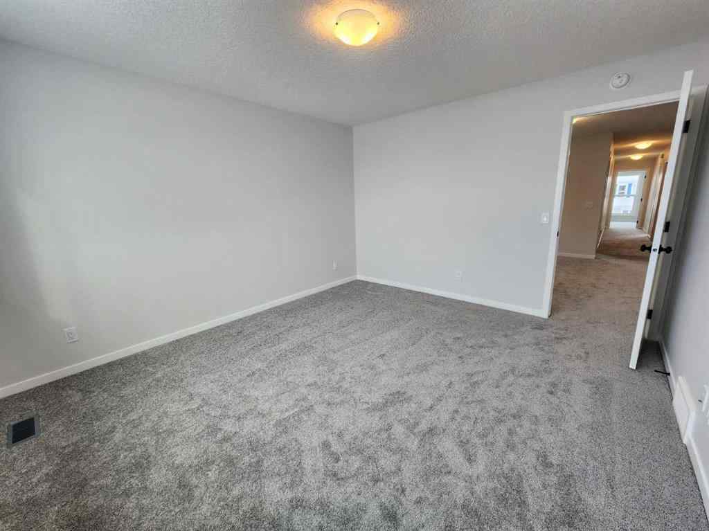 MLS® A2231806 - 86 Lucas Place NW in Livingston Calgary, Residential