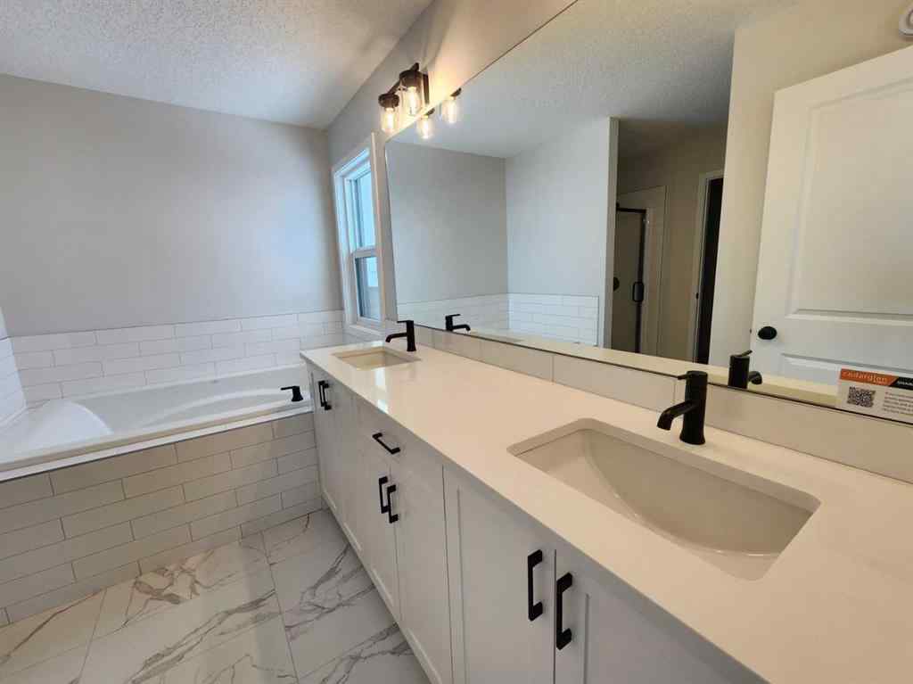 MLS® A2231806 - 86 Lucas Place NW in Livingston Calgary, Residential