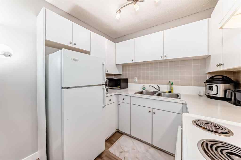 MLS® A2231934 - Unit #404C 5601 Dalton Drive NW in Dalhousie Calgary, Residential