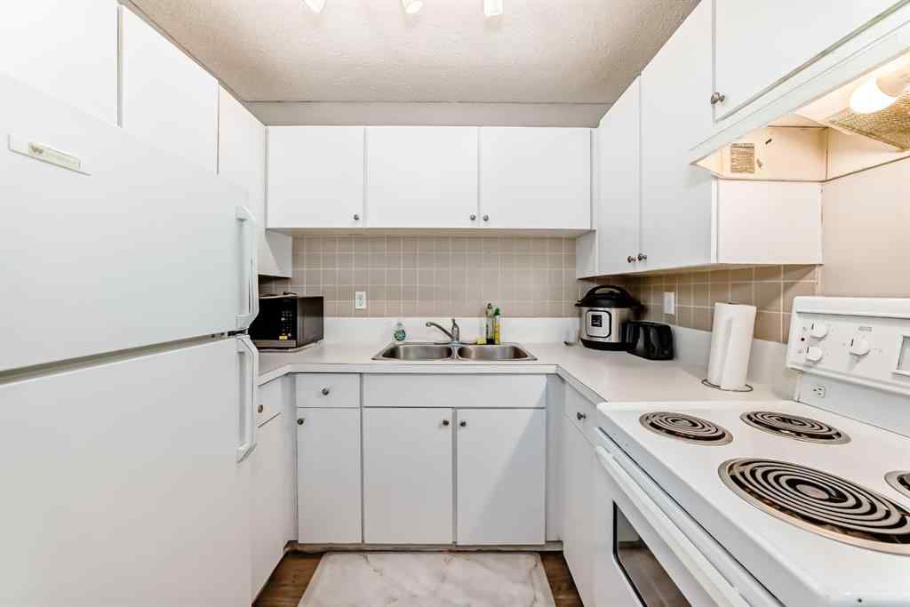 MLS® A2231934 - Unit #404C 5601 Dalton Drive NW in Dalhousie Calgary, Residential