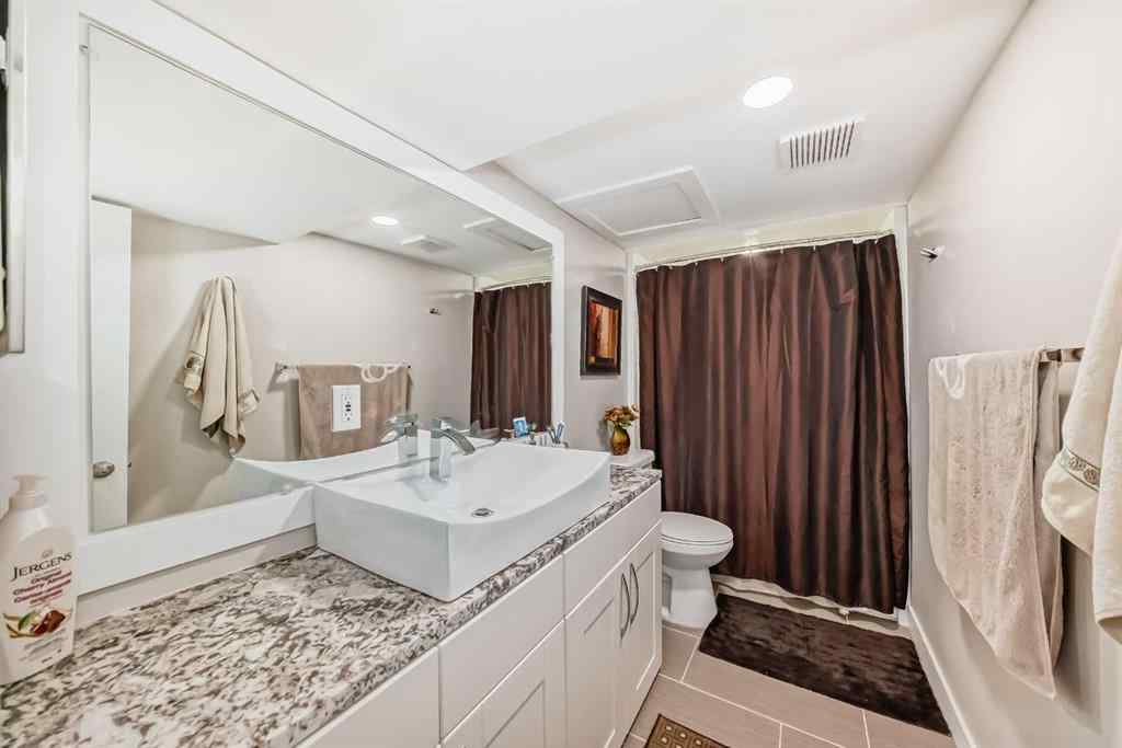 MLS® A2231979 - 103 Warwick Drive SW in Westgate Calgary, Residential