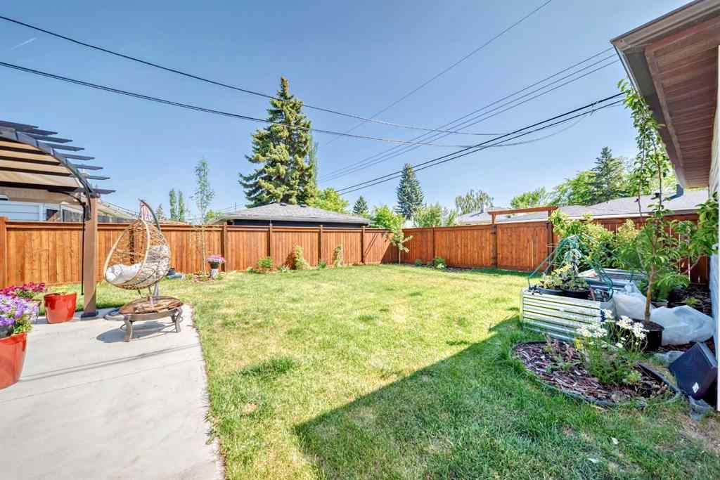 MLS® A2231979 - 103 Warwick Drive SW in Westgate Calgary, Residential
