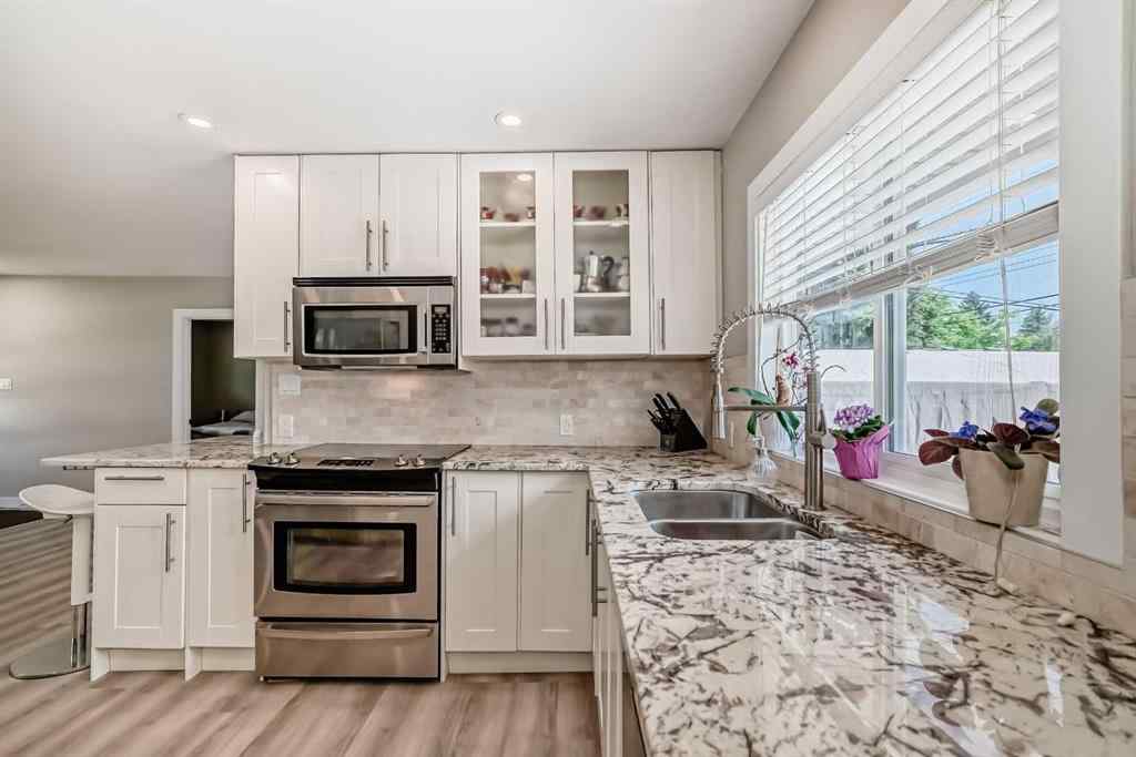 MLS® A2231979 - 103 Warwick Drive SW in Westgate Calgary, Residential