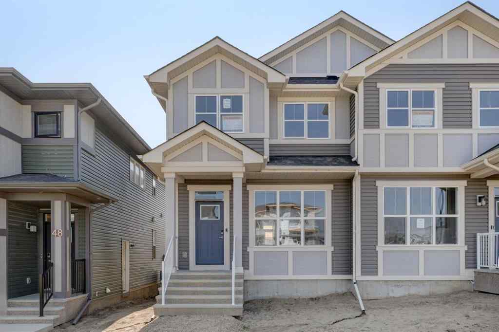MLS® A2232075 - 44 Herron Walk NE in Livingston Calgary, Residential
