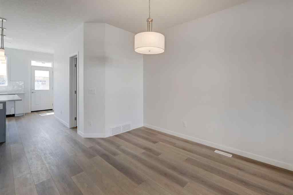 MLS® A2232075 - 44 Herron Walk NE in Livingston Calgary, Residential