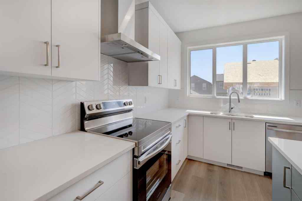 MLS® A2232075 - 44 Herron Walk NE in Livingston Calgary, Residential
