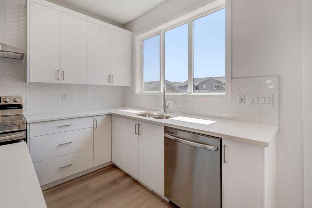 MLS® A2232075 - 44 Herron Walk NE in Livingston Calgary, Residential