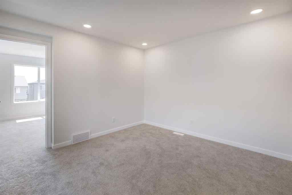MLS® A2232075 - 44 Herron Walk NE in Livingston Calgary, Residential