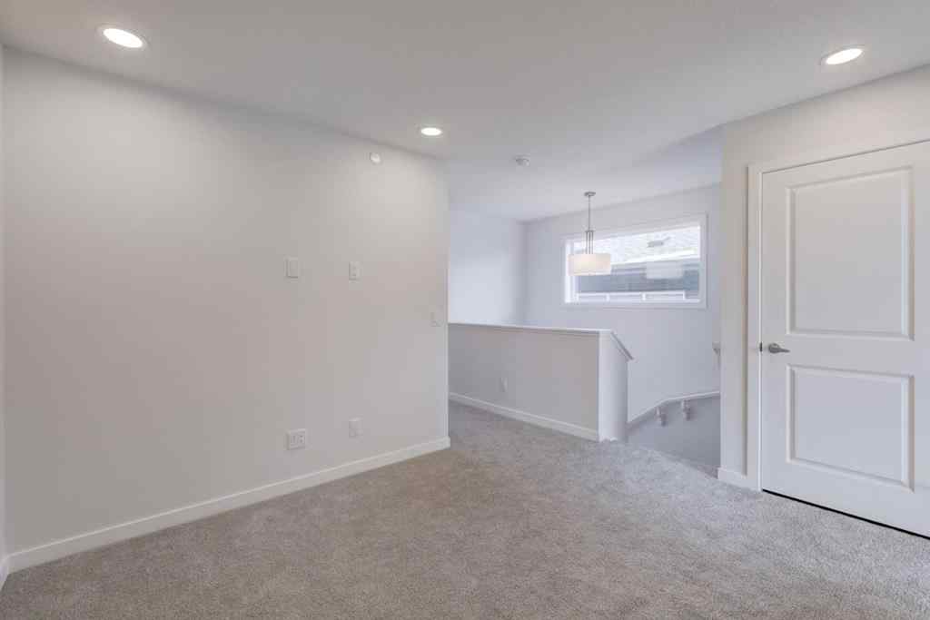 MLS® A2232075 - 44 Herron Walk NE in Livingston Calgary, Residential