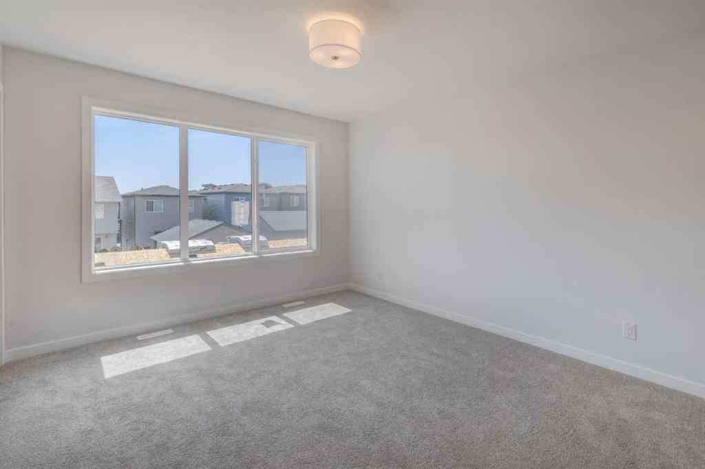 MLS® A2232075 - 44 Herron Walk NE in Livingston Calgary, Residential